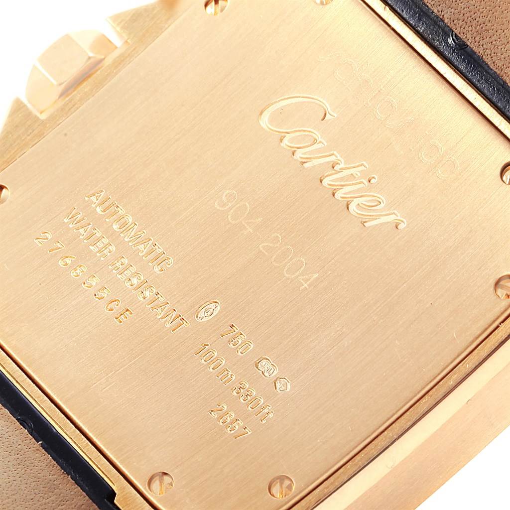 This image shows the back side of the Santos model by Cartier, highlighting engraved details and specifications.