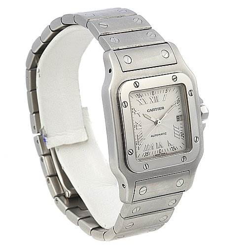 The image shows a Cartier Santos watch, angled to display the bracelet, square face, and screwe on the bezel.