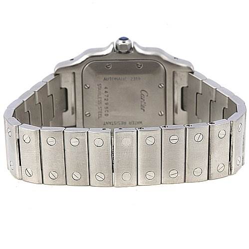 The image shows the back view of a Cartier Santos Stainless Steel Silver Dial Stainless Steel Silver Dial watch, highlighting the case back and metal bracelet with visible screws.