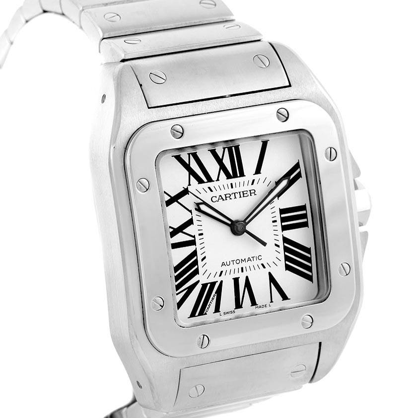 The image shows a close-up angle of the face and top part of the bracelet of a Cartier Santos W200737G Men
s Stainless Steel Silver Dial W200737G Men
s Stainless Steel Silver Dial watch.