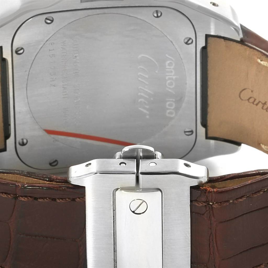 This image shows the back case and clasp of a Cartier Santos W20073X8 Men's Stainless Steel Silver Dial W20073X8 Men's Stainless Steel Silver Dial watch, highlighting the brand engraving and leather strap.