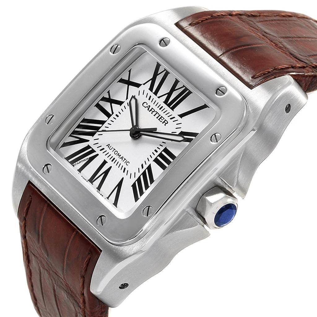 This image shows a close-up, angled view of the face, bezel, and crown of a Cartier Santos W20073X8 Men's Stainless Steel Silver Dial W20073X8 Men's Stainless Steel Silver Dial watch.