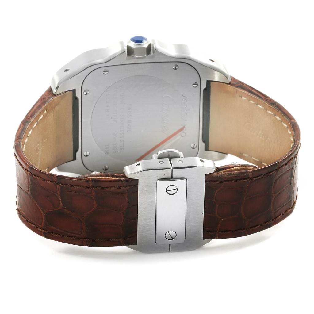 The image shows the back and clasp of a Santos de Cartier watch with a brown leather strap and visible case back details.