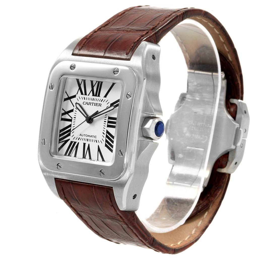 This image shows a Cartier Santos W20073X8 Men's Stainless Steel Silver Dial W20073X8 Men's Stainless Steel Silver Dial watch at a slight angle, highlighting the face, bezel, and brown leather strap.