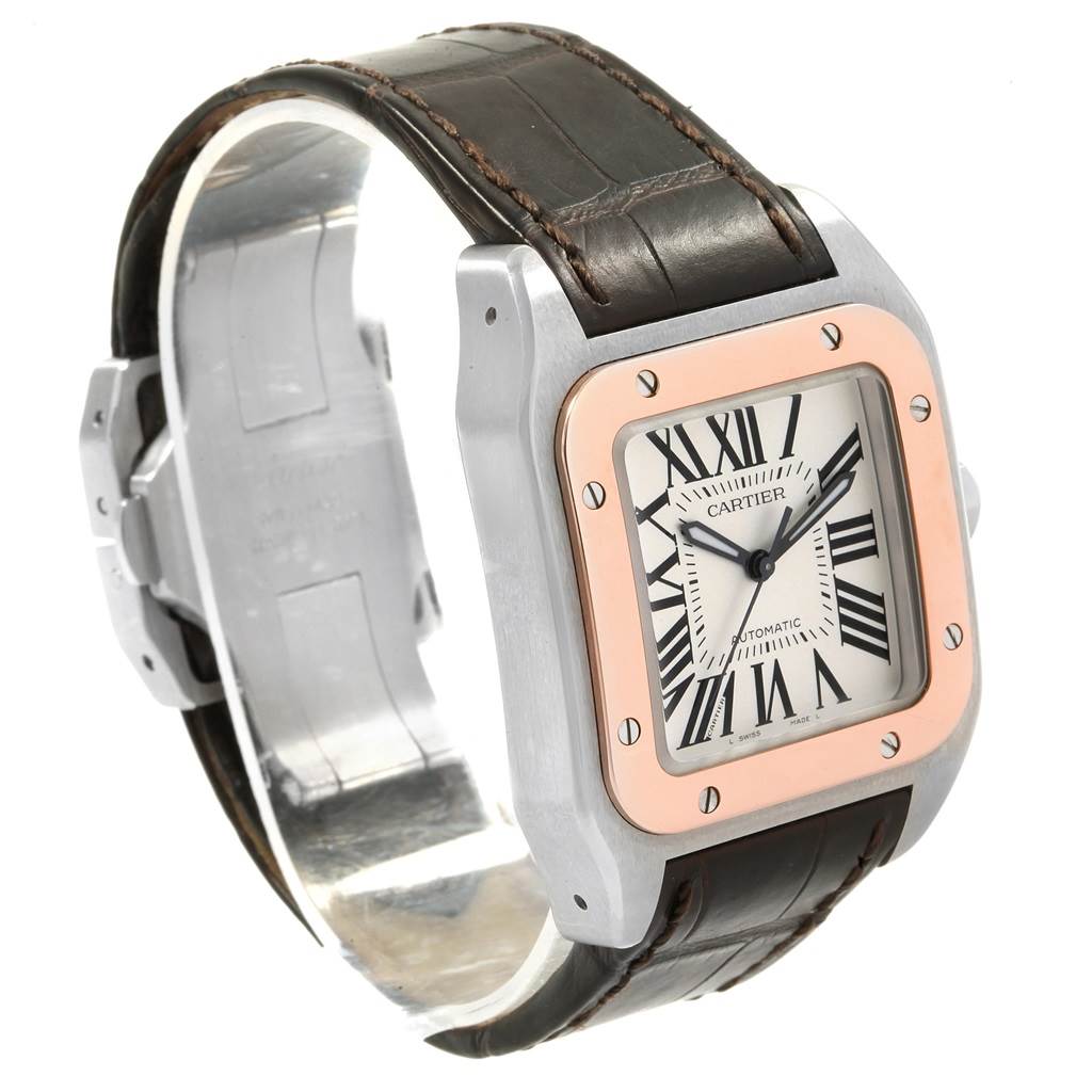 The image shows a Cartier Santos W20107X7 Men
s Stainless Steel Silver Dial W20107X7 Men
s Stainless Steel Silver Dial watch angled to display the face, bezel, and leather strap.