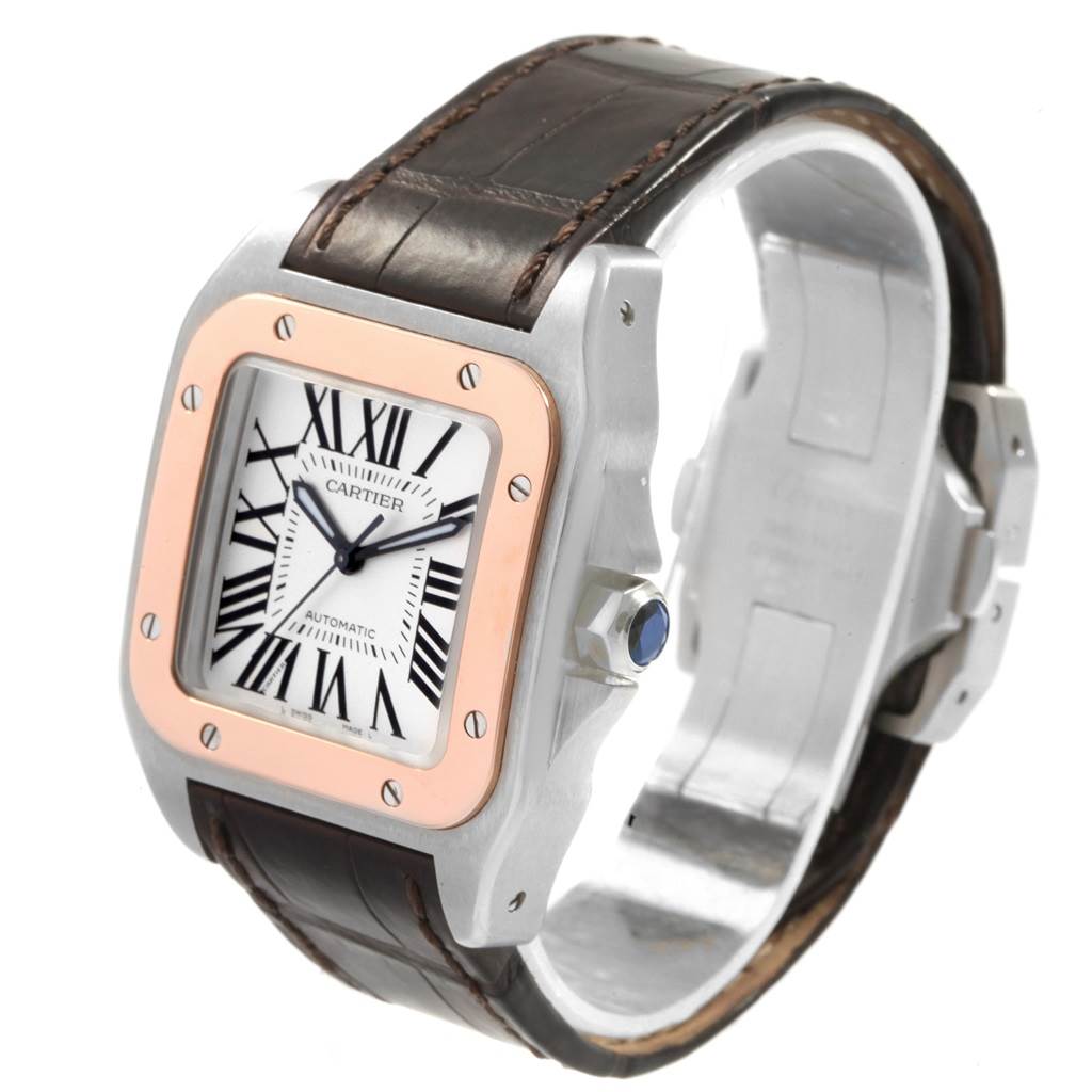 The image shows a Cartier Santos W20107X7 Men
s Stainless Steel Silver Dial W20107X7 Men
s Stainless Steel Silver Dial watch at an oblique angle, highlighting the face, bezel, and leather strap.