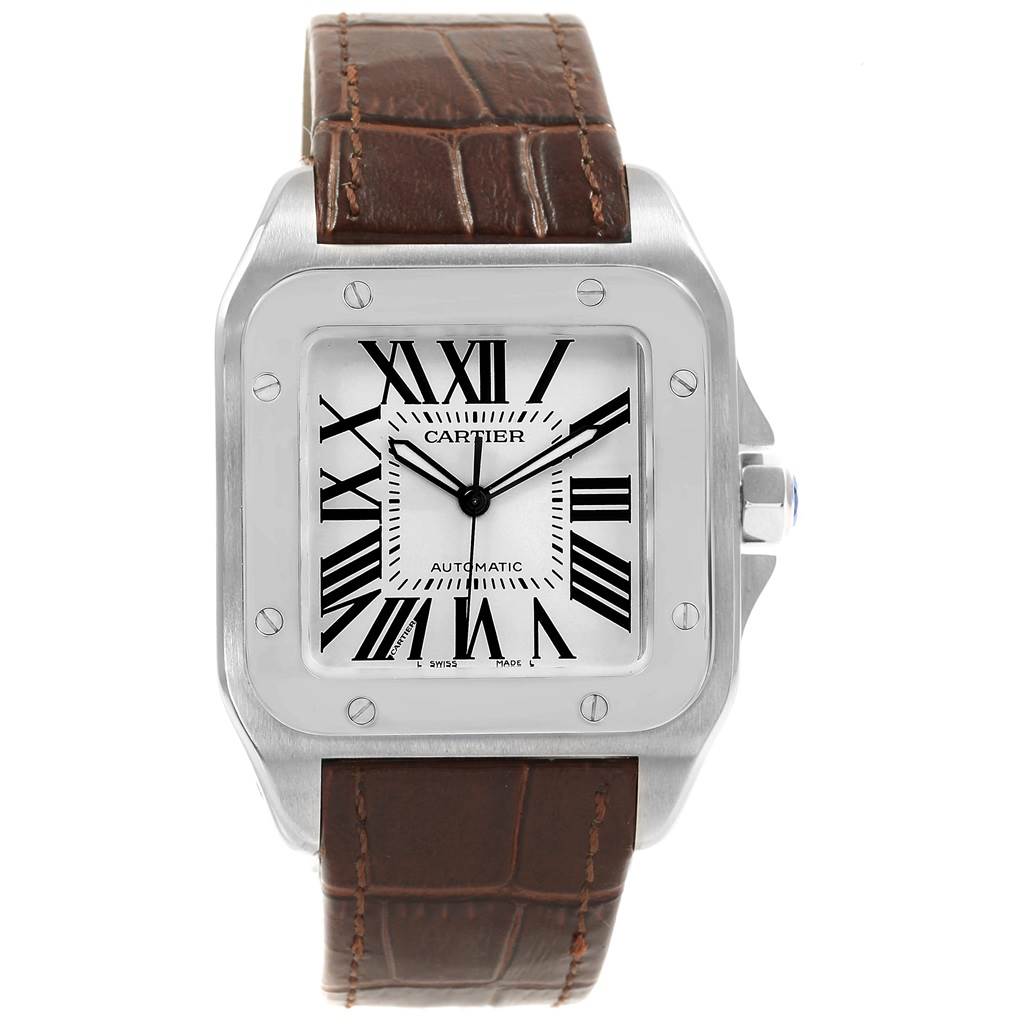 The image shows a front view of the Cartier Santos W20073X8 Men
s Stainless Steel Silver Dial W20073X8 Men
s Stainless Steel Silver Dial watch with a brown leather strap and a stainless steel case.