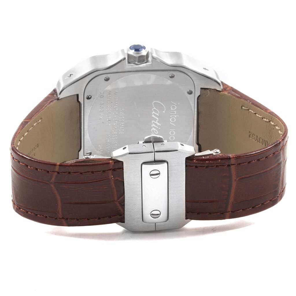 This image shows the back view of a Santos model Cartier watch, displaying the case back and brown leather strap with buckle.
