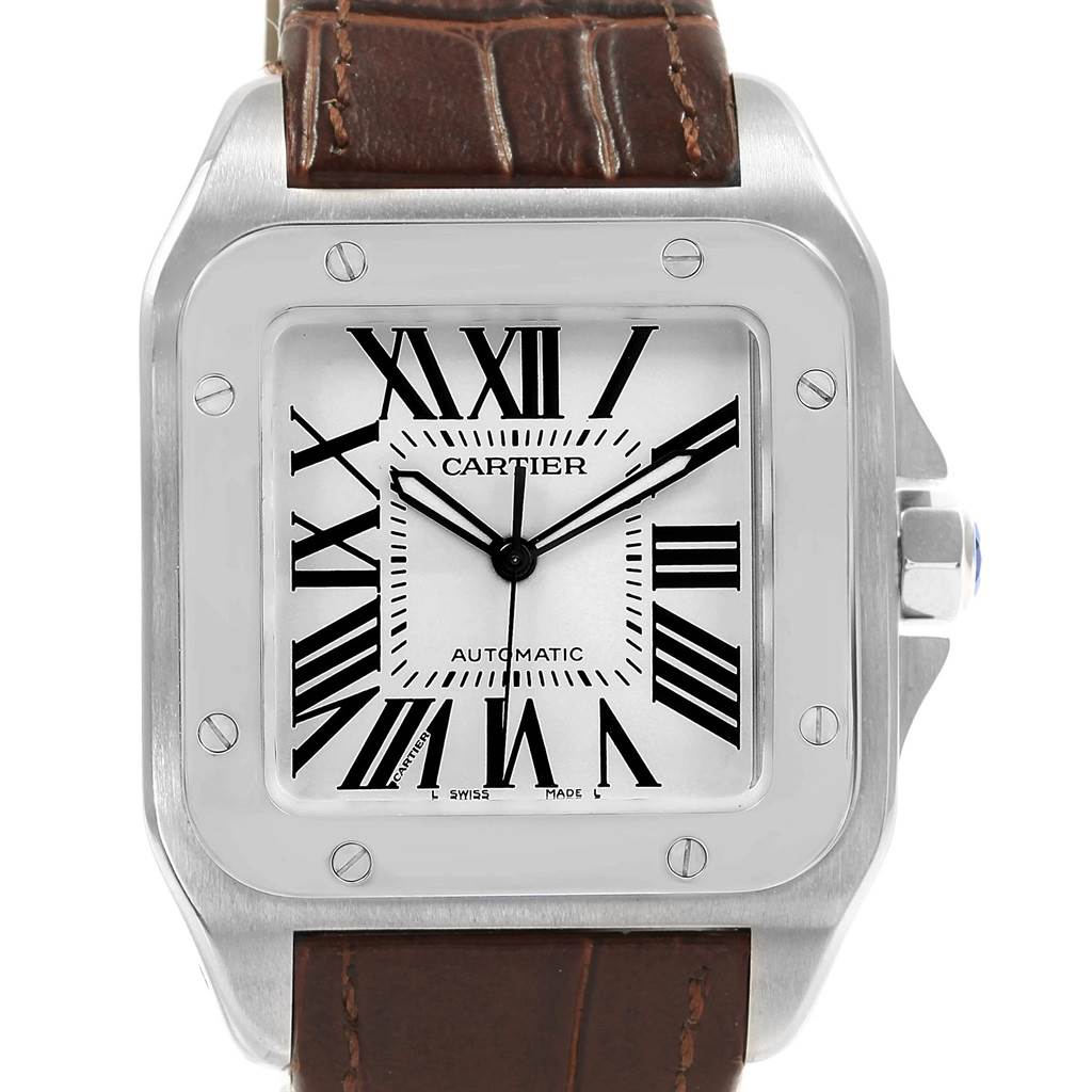 The Santos model by Cartier is shown at a front angle, highlighting its square face, Roman numerals, and brown leather strap.