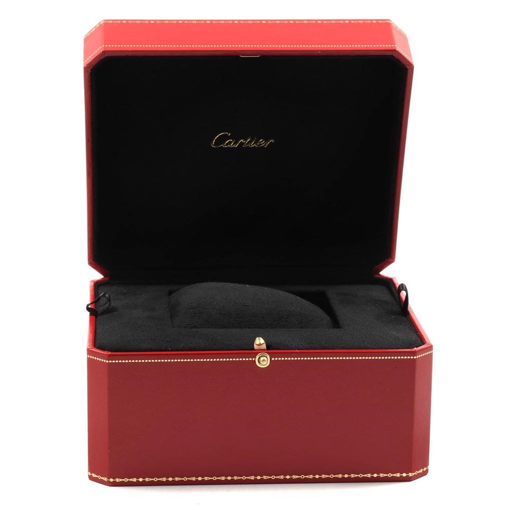 This is an open red Cartier watch box for the Santos model, showcasing the interior branded lining.