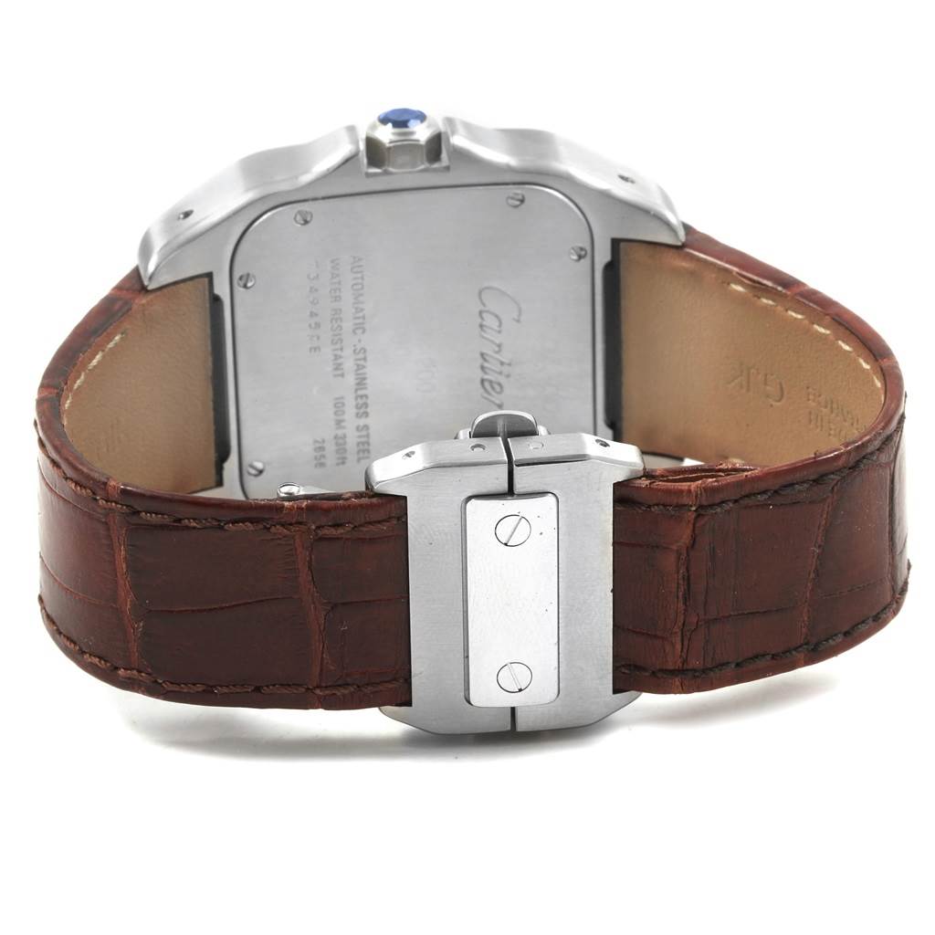 The image shows a Cartier Santos W20073X8 Men
s Stainless Steel Silver Dial W20073X8 Men
s Stainless Steel Silver Dial watch from the back, highlighting the case back and brown leather strap.