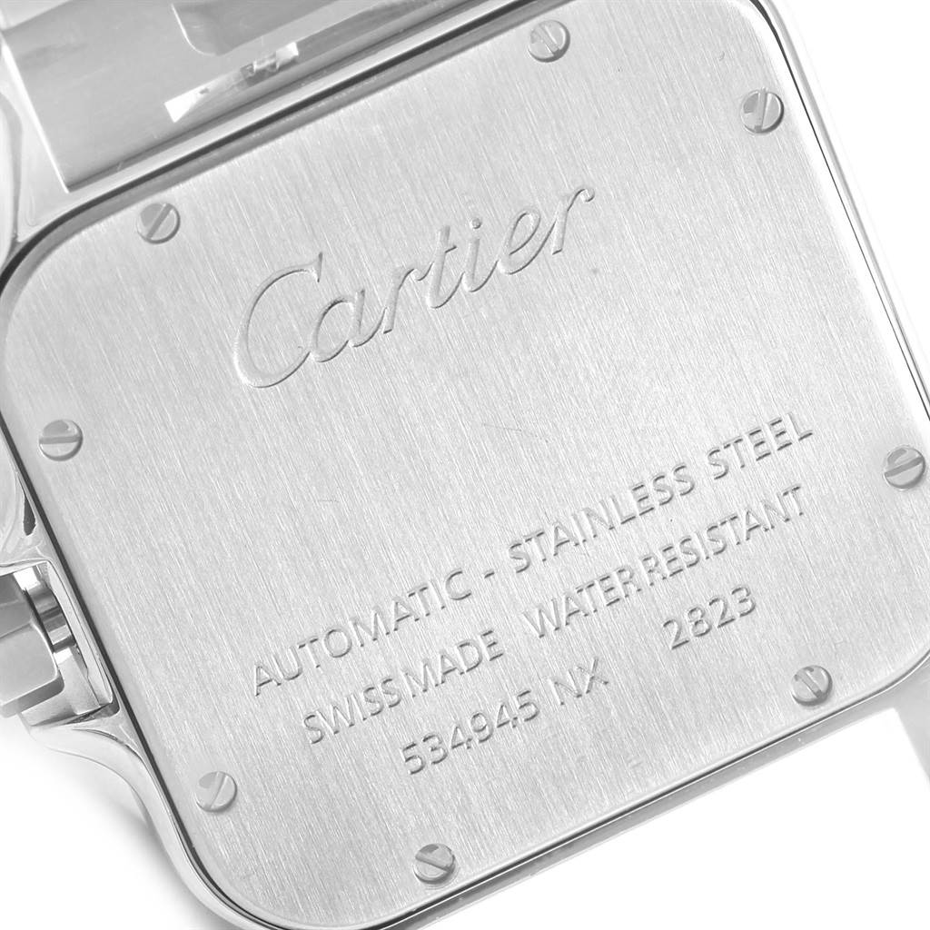 This image shows the engraved stainless steel case back of a Cartier Santos W20098D6 Men
s Stainless Steel Silver Dial W20098D6 Men
s Stainless Steel Silver Dial watch, highlighting branding and specifications.