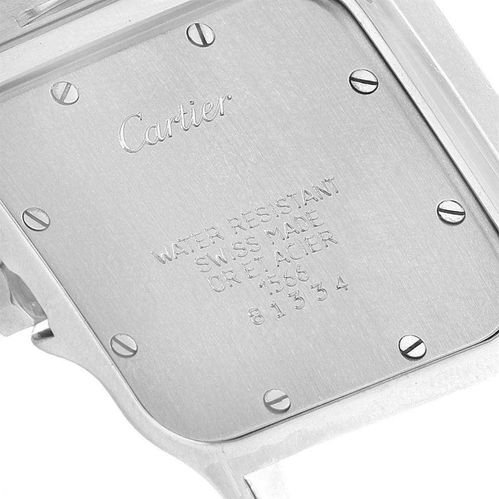 The image shows the back case of a Santos model by Cartier, displaying its brand and specifications.