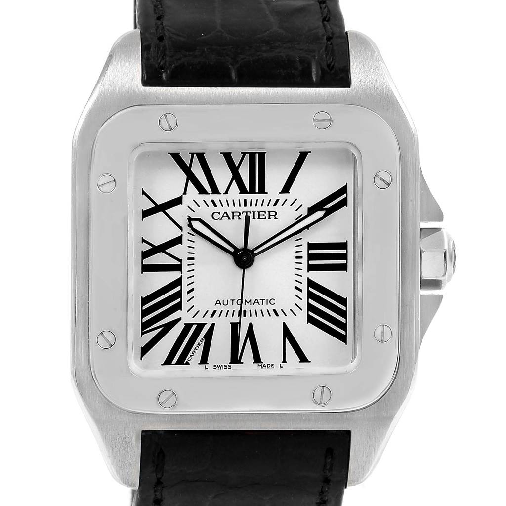The image shows a front-facing view of a Cartier Santos W20073X8 Men
s Stainless Steel Silver Dial W20073X8 Men
s Stainless Steel Silver Dial watch with visible Roman numerals, hands, and crown.