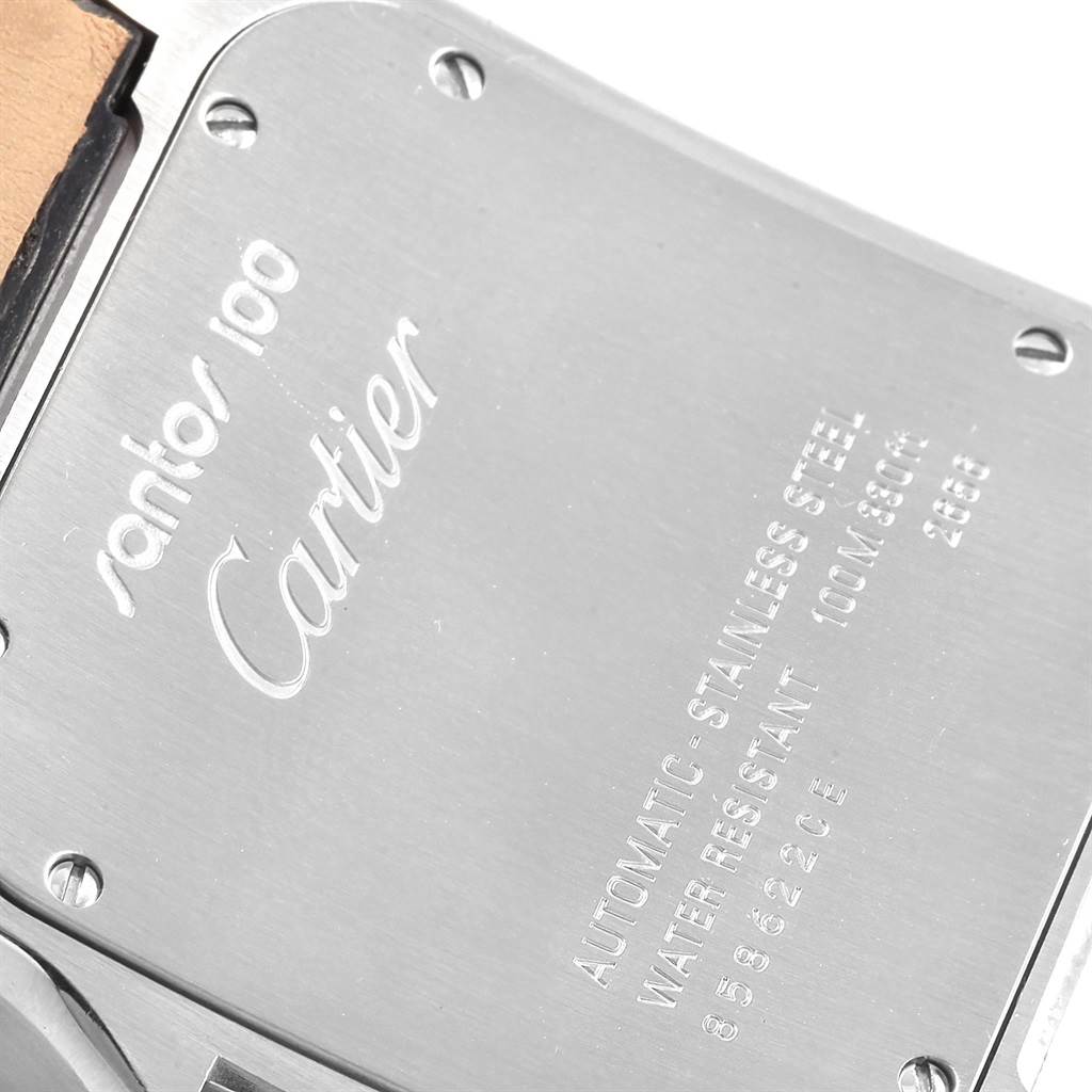 This image shows the back case of a Cartier Santos W20073X8 Men's Stainless Steel Silver Dial W20073X8 Men's Stainless Steel Silver Dial 100 watch, highlighting the brand engraving and watch specifications.