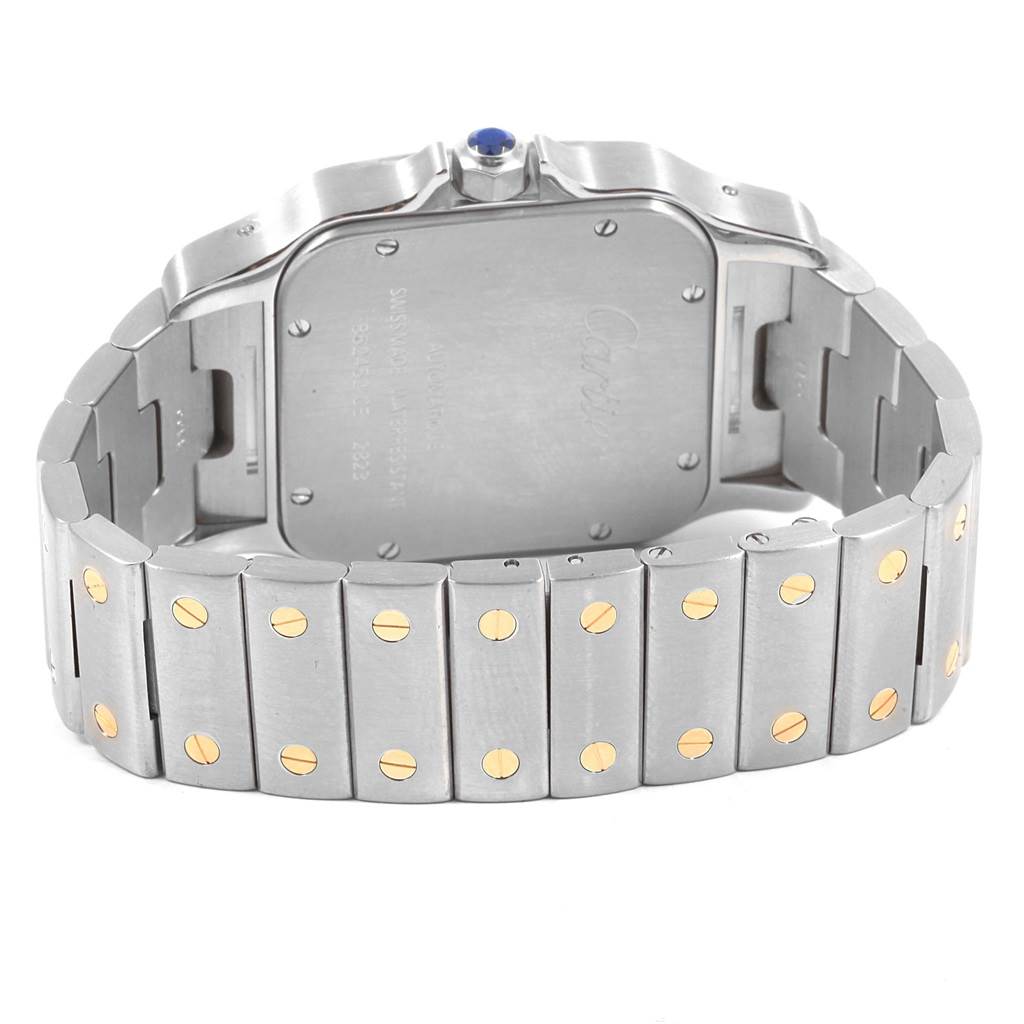 The image shows the back view of a Cartier Santos W20099C4 Men's Stainless Steel Silver Dial W20099C4 Men's Stainless Steel Silver Dial watch, highlighting the case back and the metal bracelet.