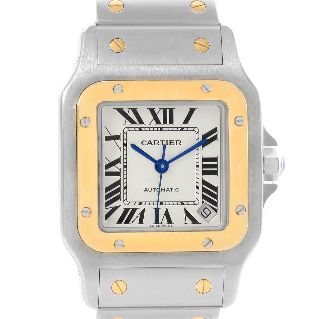 The image shows a front view of the Cartier Santos W20099C4 Men's Stainless Steel Silver Dial W20099C4 Men's Stainless Steel Silver Dial watch, highlighting the dial, bezel, and part of the bracelet.