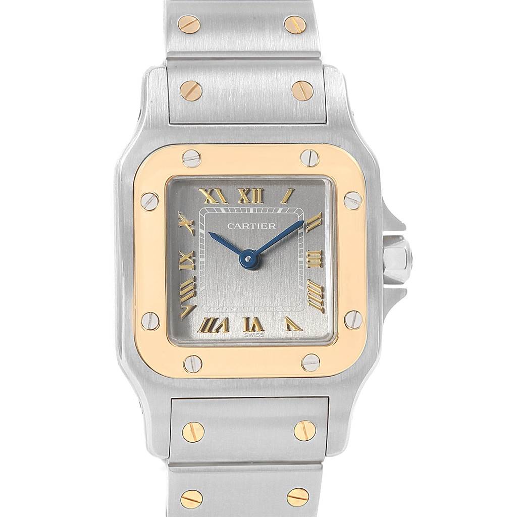 This image shows a front view of a Cartier Santos 1057930 Stainless Steel Grey Dial 1057930 Stainless Steel Grey Dial watch, focusing on its square dial and part of its stainless steel and gold case and bracelet.