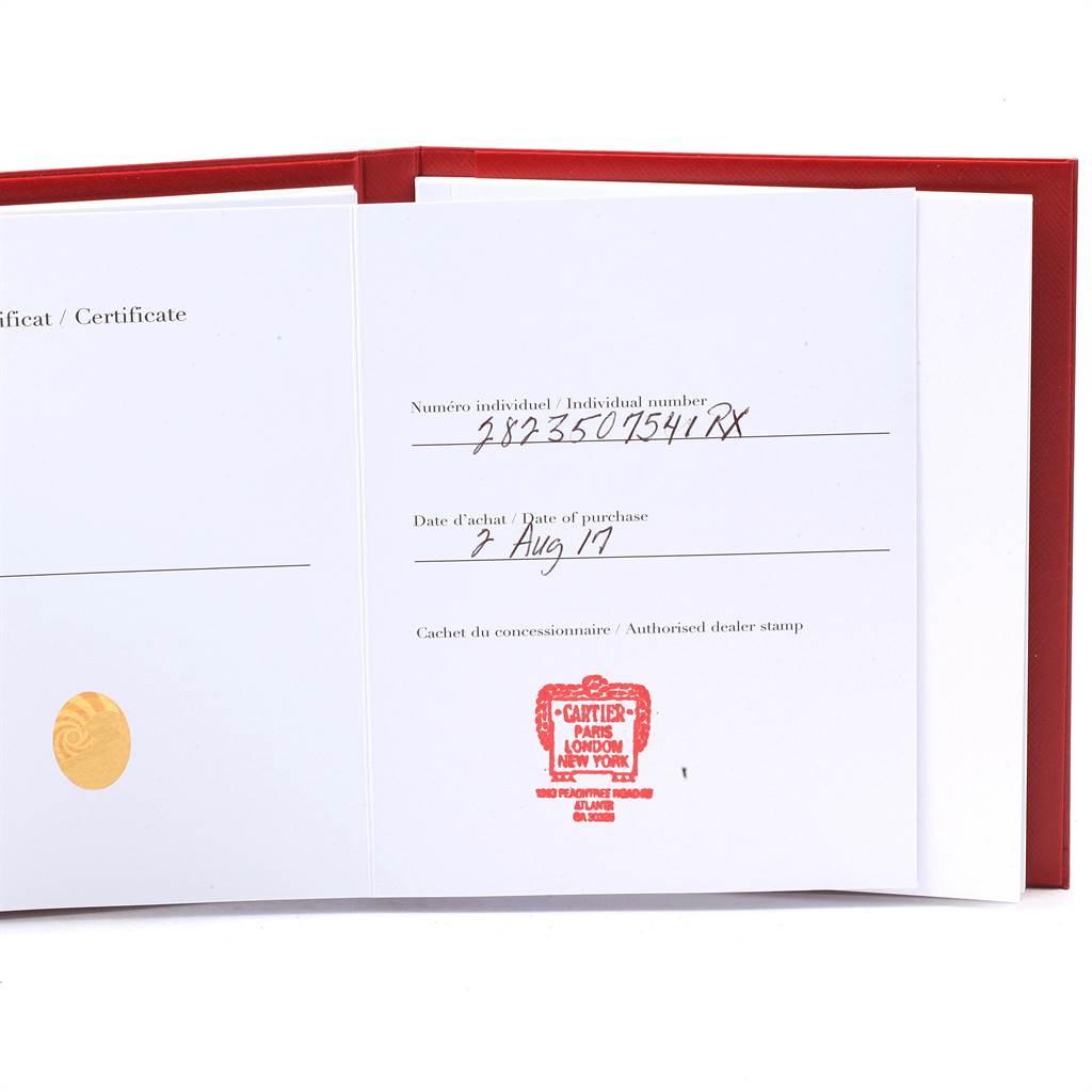 This image shows the certificate of authenticity for a Santos model by Cartier, detailing purchase date and dealer stamp.