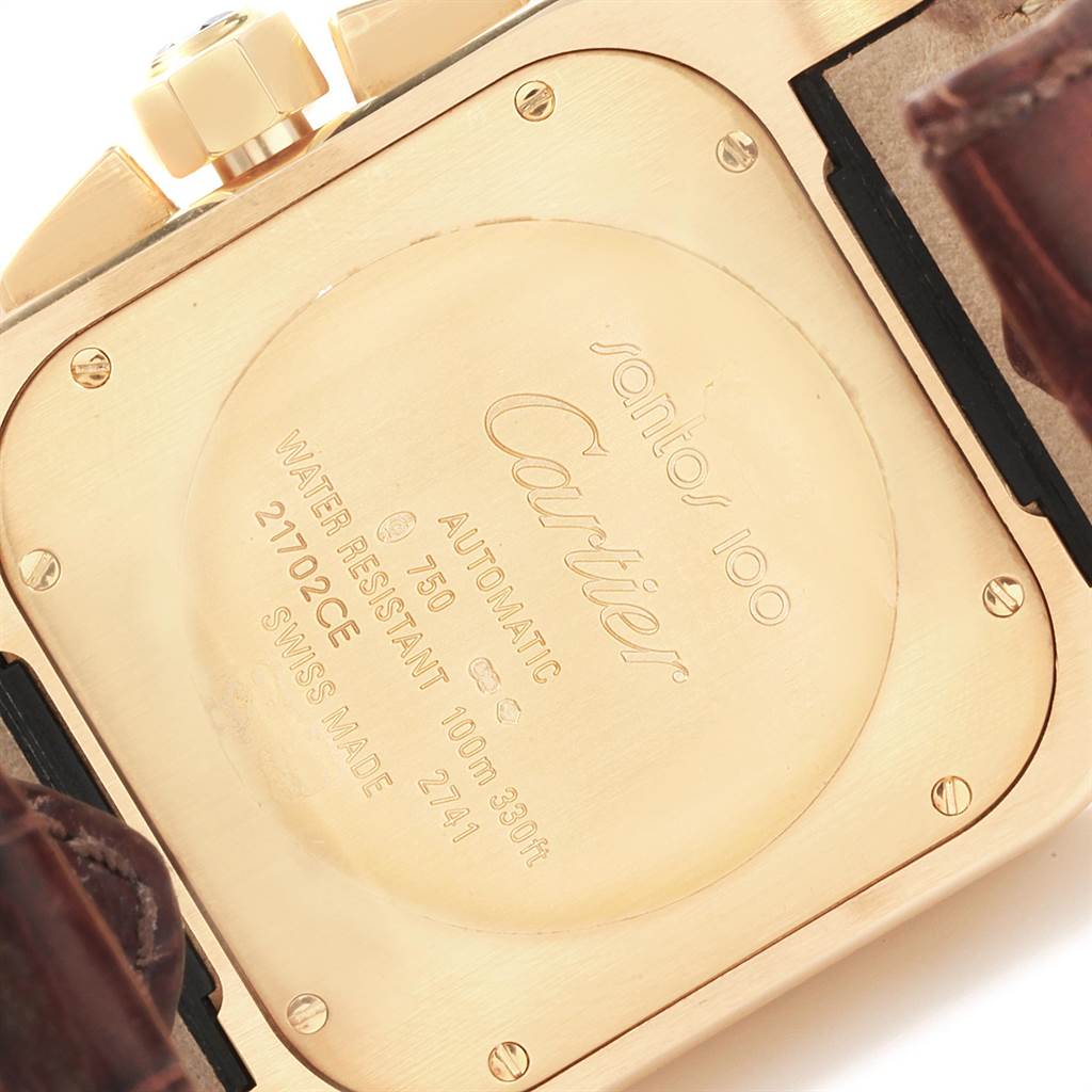 The image shows the back case of a Cartier Santos W20096Y1 Men's Stainless Steel Silver Dial W20096Y1 Men's Stainless Steel Silver Dial 100 watch, highlighting the engraved details.