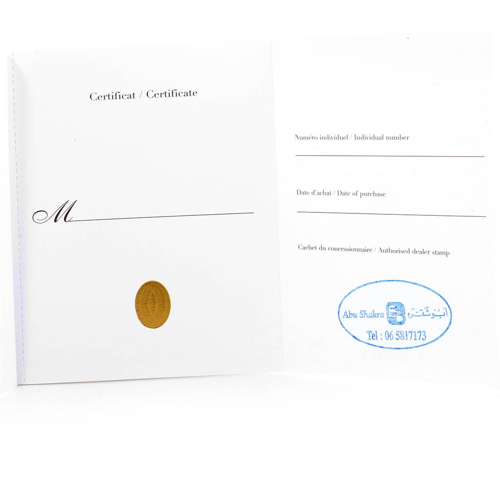 This image shows the certificate or warranty card for the Cartier Santos W20124U2 Men
s Rose Gold Black Dial W20124U2 Men
s Rose Gold Black Dial model watch, displaying purchase details and dealer stamp sections.