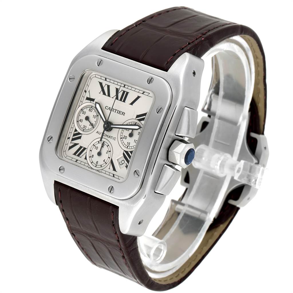 The Cartier Santos W20090X8 Men's Stainless Steel Silver Dial W20090X8 Men's Stainless Steel Silver Dial watch is shown at a three-quarter angle, highlighting its square dial, leather strap, and chronograph features.
