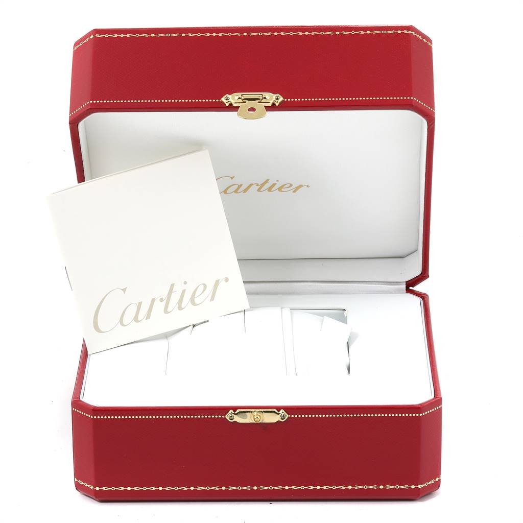 The image shows an open Cartier Santos W20098D6 Stainless Steel Silver Dial W20098D6 Stainless Steel Silver Dial watch box with a booklet inside.