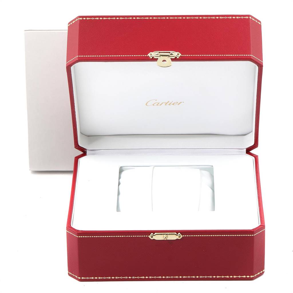 This image shows an open Cartier Santos W20055D6 Men's Silver Dial W20055D6 Men's Silver Dial watch box, displaying its red exterior and white interior.