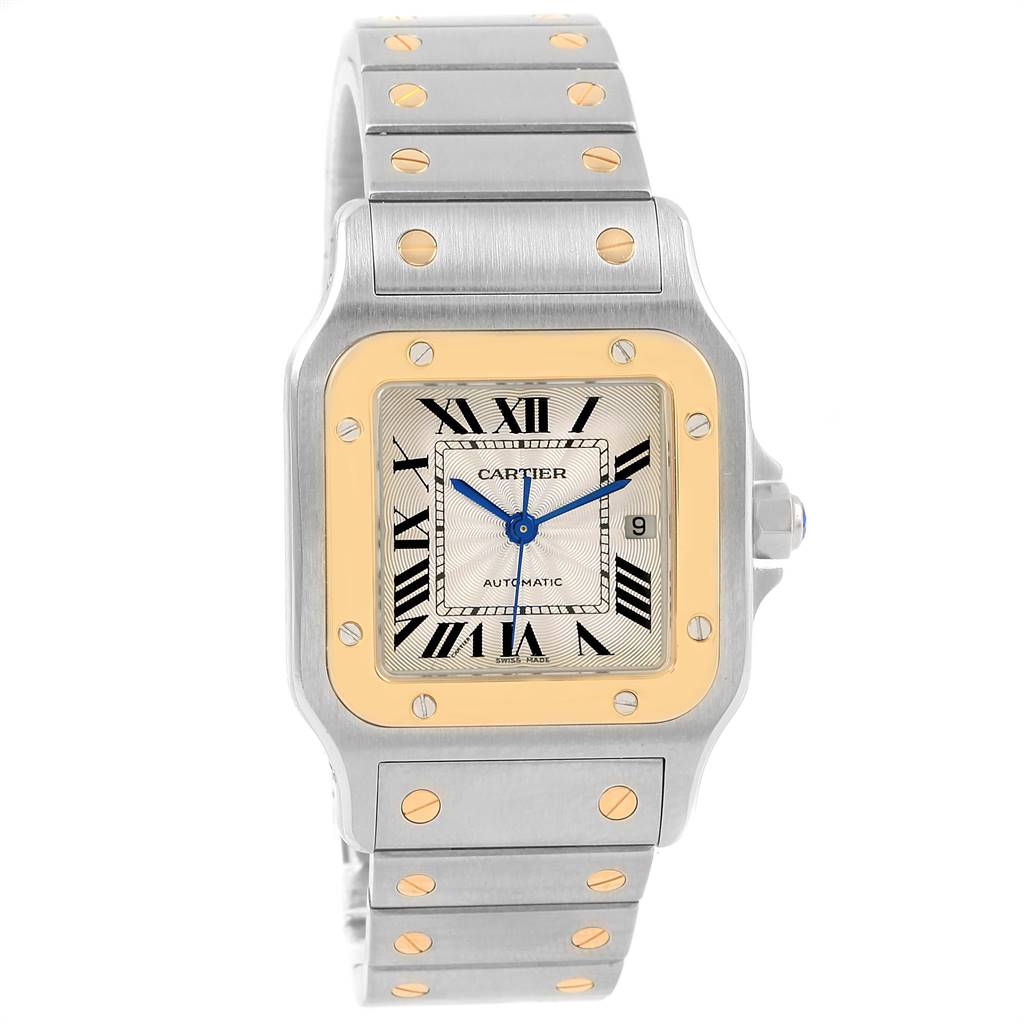 A front view of the Cartier Santos W20058C4 Men's Stainless Steel Silver Dial W20058C4 Men's Stainless Steel Silver Dial watch shows the face, bezel, and part of the metal bracelet.