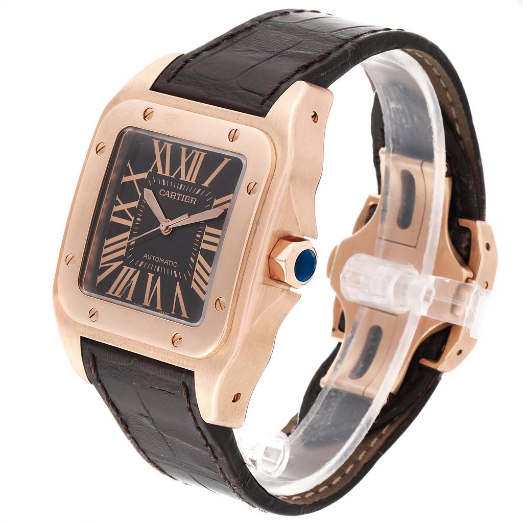 The image shows a Cartier Santos W20127Y1 Men's Rose Gold Brown Dial W20127Y1 Men's Rose Gold Brown Dial watch at an angled view, highlighting its face, gold case, crown, and leather strap.