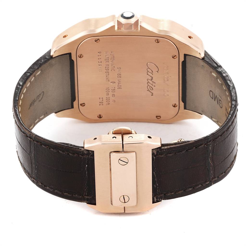 The image shows the back case, crown, and leather strap of a Cartier Santos W20127Y1 Men's Rose Gold Brown Dial W20127Y1 Men's Rose Gold Brown Dial watch.
