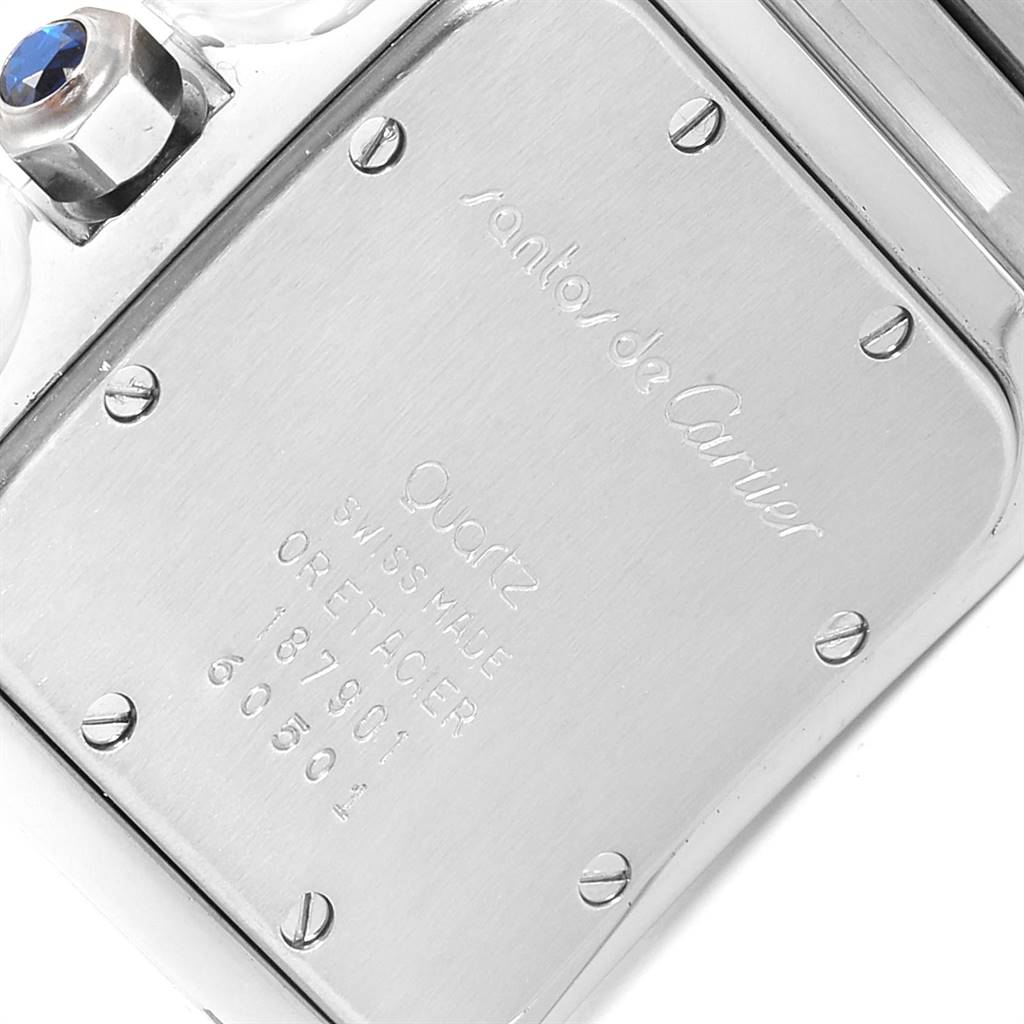 This is a close-up of the case back and crown of a Cartier Santos 15363 Stainless Steel Silver Dial 15363 Stainless Steel Silver Dial model watch.