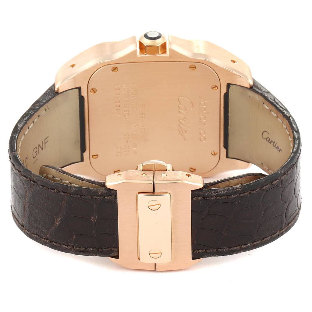 The image shows the back of a Cartier Santos W20095Y1 Men's Rose Gold Silver Dial W20095Y1 Men's Rose Gold Silver Dial watch, including the case back, crown, and leather strap clasp.