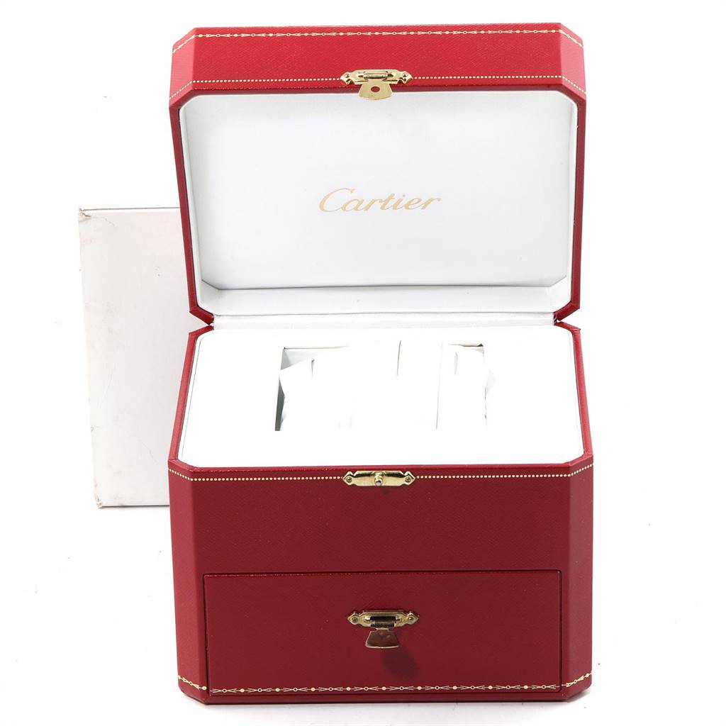 The image shows an open Cartier Santos W20095Y1 Men's Rose Gold Silver Dial W20095Y1 Men's Rose Gold Silver Dial watch box, revealing the interior space for storing the watch.