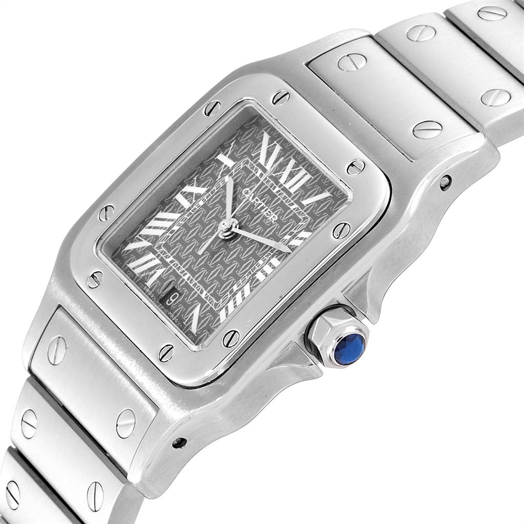 This image shows a close-up angle of the Santos watch by Cartier, highlighting the face, dial, bezel, and part of the bracelet.