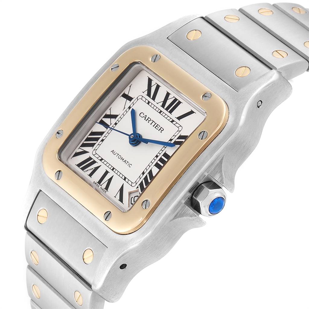 This image shows a close-up angle of the Cartier Santos W20099C4 Stainless Steel Silver Dial W20099C4 Stainless Steel Silver Dial watch face, bezel, crown, and part of the bracelet.