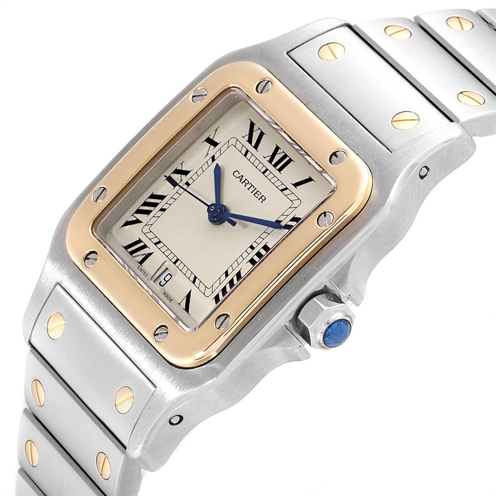 The Cartier Santos 187901 Stainless Steel Silver Dial 187901 Stainless Steel Silver Dial watch is shown at an angle highlighting the face, bezel, part of the bracelet, and the crown.