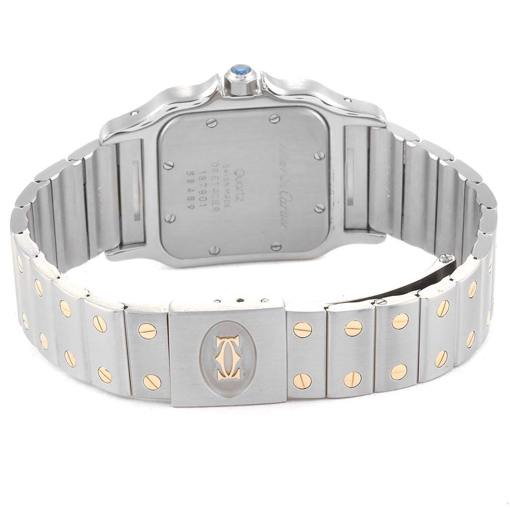 This image shows the back and bracelet of a Santos model by Cartier, highlighting the case back and clasp with decorative screws.