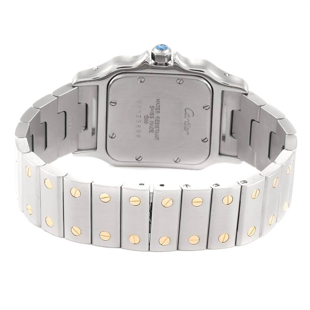 The image shows the back case and bracelet of a Santos model by Cartier from a rear angle.