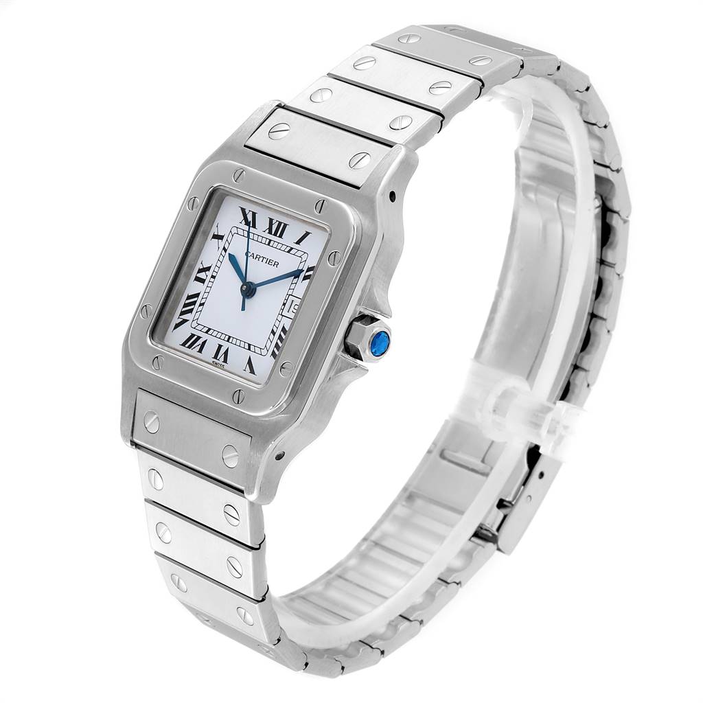 The image shows a Cartier Santos Men's Stainless Steel Blue Dial Men's Stainless Steel Blue Dial watch from a three-quarter angle, highlighting its rectangular face, bezel, and metal bracelet.