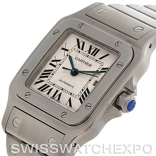 This image shows a close-up, angled view of the Cartier Santos Stainless Steel Silver Dial Stainless Steel Silver Dial model watch, highlighting its dial, bezel, and part of the bracelet.