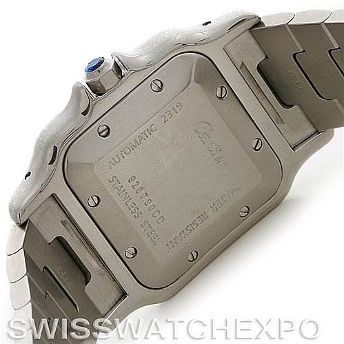 The image shows the back and side of a Santos de Cartier watch, highlighting its stainless steel case and bracelet.