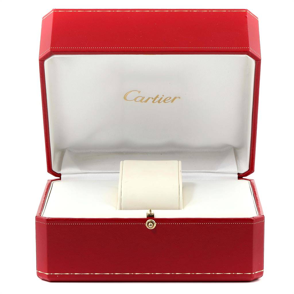 The image shows an empty red Cartier watch box prepared to hold a Santos model watch.