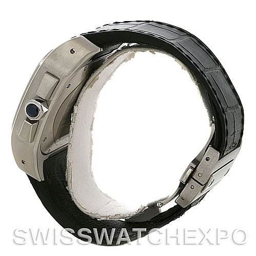 This image shows a side view of a Santos model watch by Cartier, highlighting the crown and part of the leather strap.