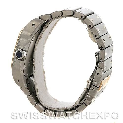 The image shows a side angle of a Santos model watch by Cartier, highlighting the bracelet and the crown.