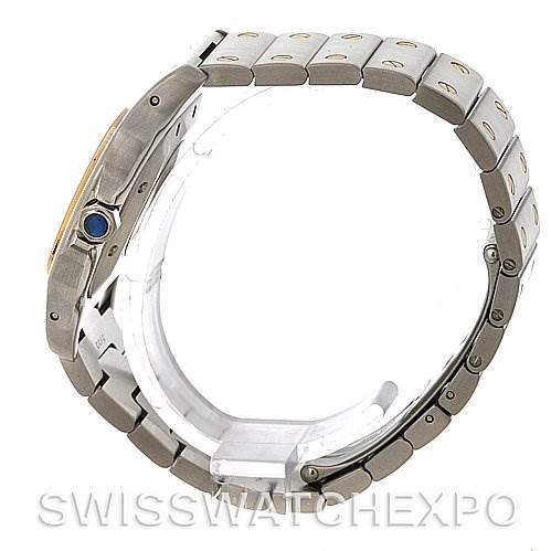The image shows a side view of the Cartier Santos W20058C4 Men's Stainless Steel Silver Dial W20058C4 Men's Stainless Steel Silver Dial model watch, highlighting the band and crown with a blue gemstone.