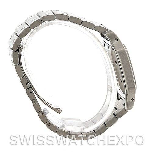 The image shows a side profile of a Cartier Santos W20055D6 Men
s Stainless Steel Silver Dial W20055D6 Men
s Stainless Steel Silver Dial watch, highlighting the bracelet and case in a partially closed position.