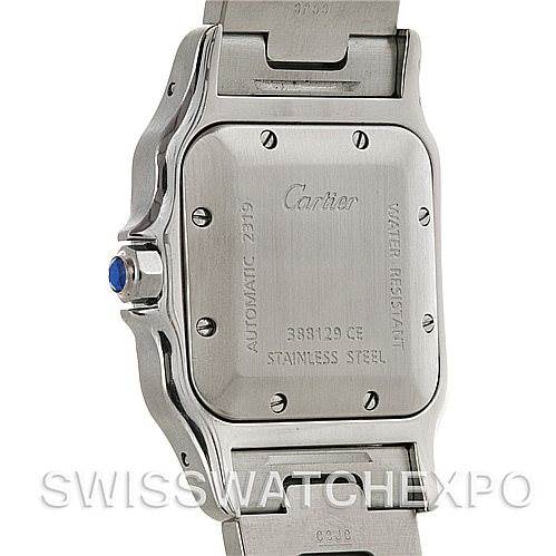 This image shows the back case of a Santos model by Cartier, including the deployant clasp and crown with a blue stone.