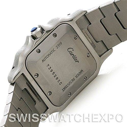 This image shows the back case and part of the bracelet of a Cartier Santos W20058C4 Men's Stainless Steel Silver Dial W20058C4 Men's Stainless Steel Silver Dial watch.