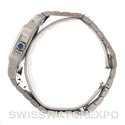 This image shows a side view of the Cartier Santos W20098D6 Men's Stainless Steel Silver Dial W20098D6 Men's Stainless Steel Silver Dial watch, highlighting the blue cabochon crown and the metal bracelet.